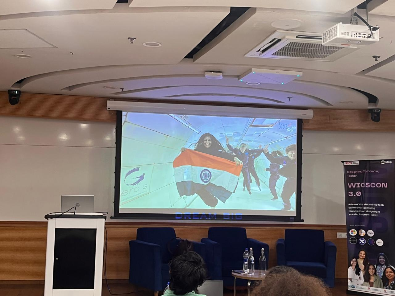 Dr. Srimathy Kesan presenting at WiCSCon 3.0 with Space Kidz India imagery on screen
